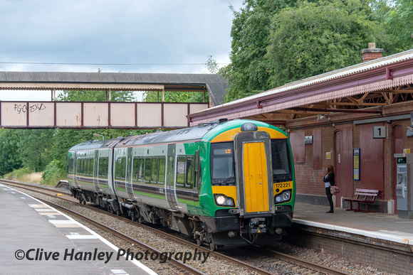 A service train from Birmingham arrives at Henley in Arden to collect 1 passenger.