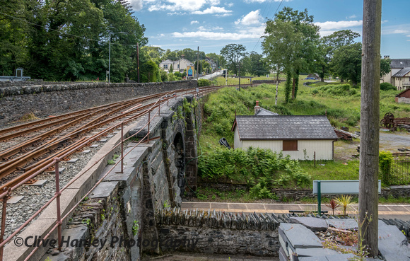 To the west of the station is a bridge over the standard gauge mainline to Pwllheli.