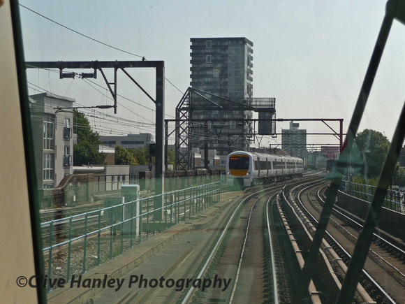 DLR runs parallel with the track out of Fenchurch Street Station.