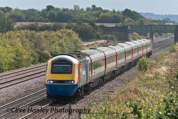 An 8-car HST heads north with driving unit no 43054 at the head.