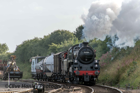 Newly restored Riddles Standard Class 4 loco no 76084 approaches Weybourne with the early freight.