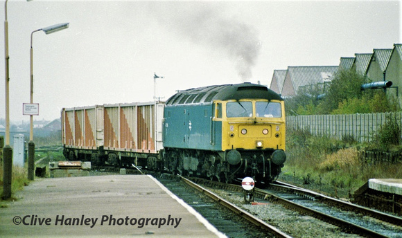 Class 47 no 47366 hauls the loaded train out of the sidings en route to Appley Bridge landfill