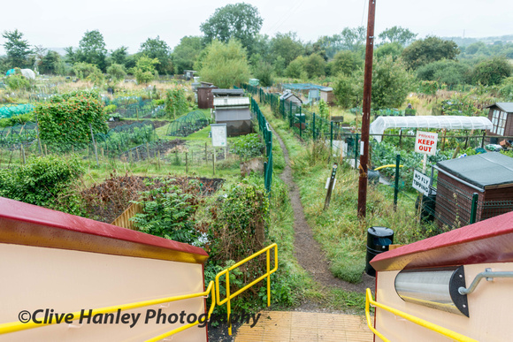 The west end of the bridge passes through allotments.