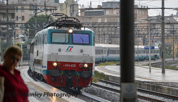 An express passes through Sestri Levante hauled by loco 444-028.