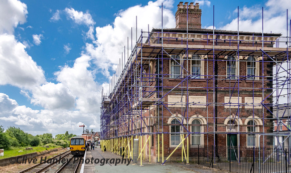 The HQ building of the Cambrian Railway is shrouded in scaffolding. The structure is council owned.