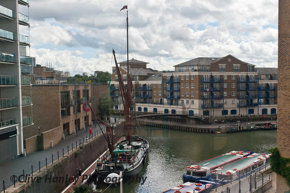 A Thames barge is moored in Limehouse Basin.