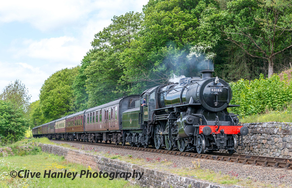 Ivatt 2-6-0 mogul no 43106 heads south past Dowles Junction with the 12.25 from Bridgnorth