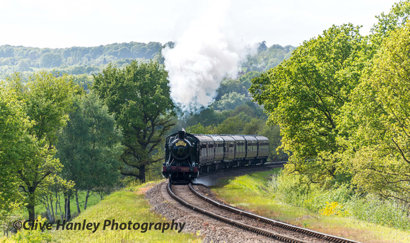 2-8-0 no 2857 climbs towards the tunnel mouth past Bewdley International Airport with the 2.55 from Bridgnorth