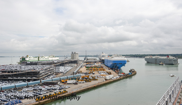 A busy scene with 3 vehicle carriers as well as Mein Schiff I