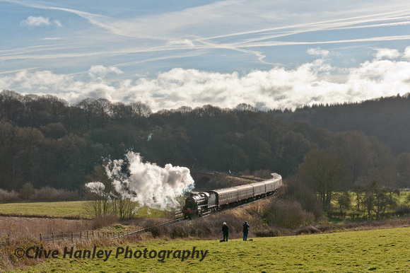 Stanier 2-6-0 Mogul nio 42968 climbs away from Victoria Bridge passing Mike & Graham doing their thing.