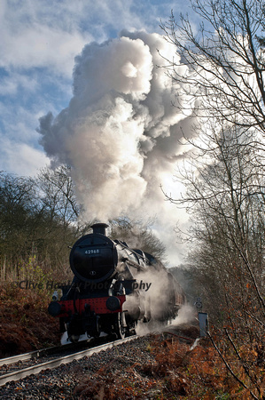 42968 accelerates away from the road crossing at the Country Halt.