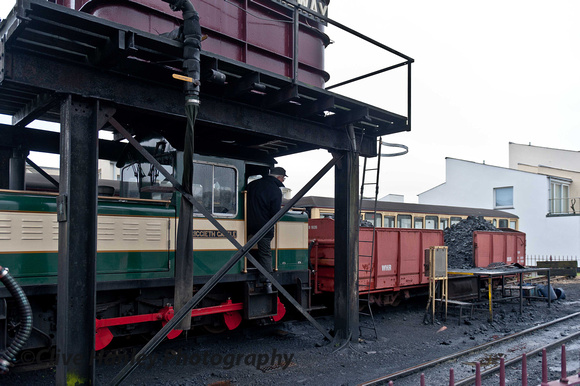The little diesel shunter was bumbling about shunting the coal wagon.