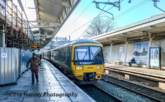Newport.  Unit 166208 arrives on platform 2 with the 14.30 Cardiff Central to Bristol Temple Meads