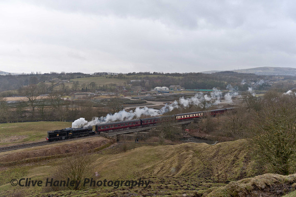 With the exotic backdrop of the local sewage works no 61994 heads south towards Irwell Vale with the 14.05 from Rawtenstall.