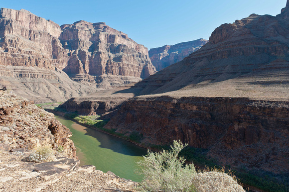 Down at the bottom of the canyon flows the Colorado River.