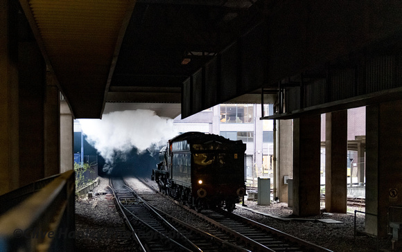 7029 returns from Moor Street after crossing tracks.