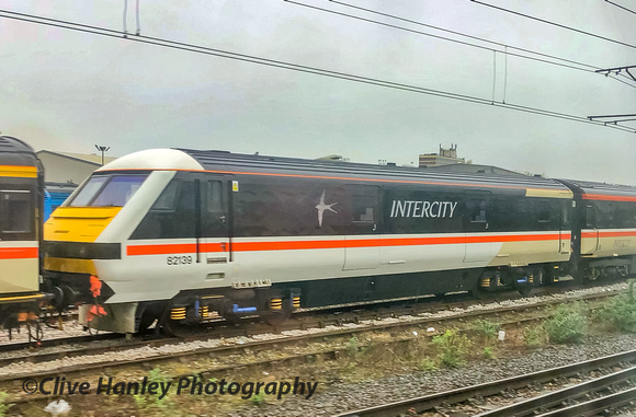 DVT no 82139 in swallow Inter City livery with matching coaches.