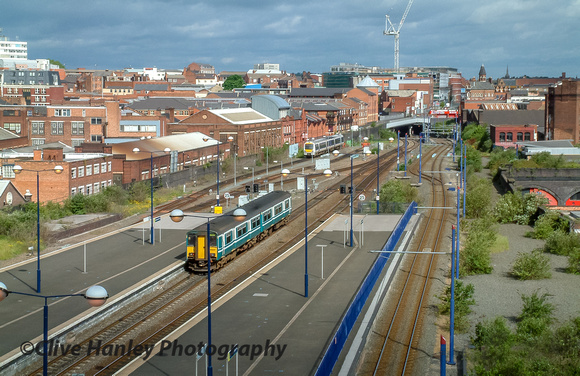 The Anglia liveried Class 152 departs northbound