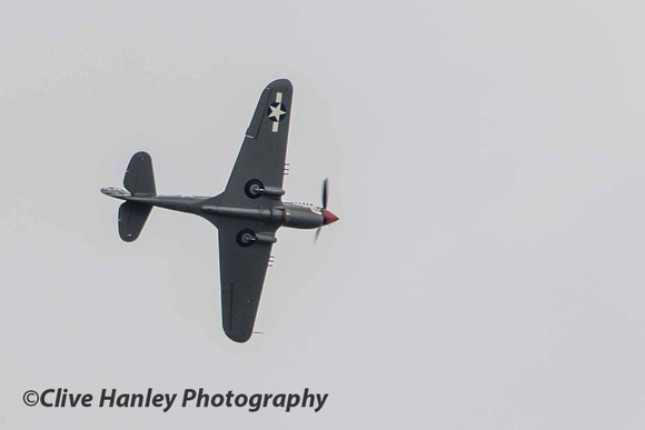 Peter Teichman appeared overhead in his Curtiss P40 Kittyhawk.