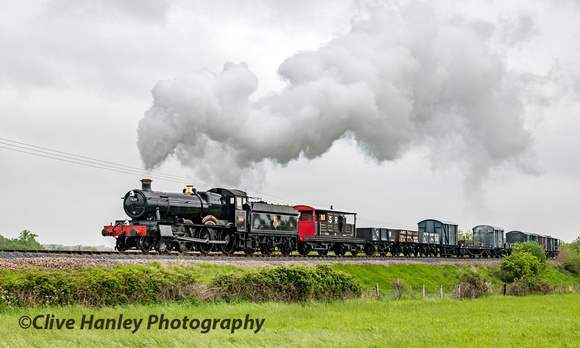 7820 Dinmore Manor heads past Didbrook with a goods train.