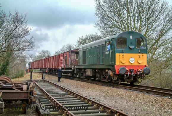 Class 20 no D8098 couples up to the goods train at Rothley Brook.