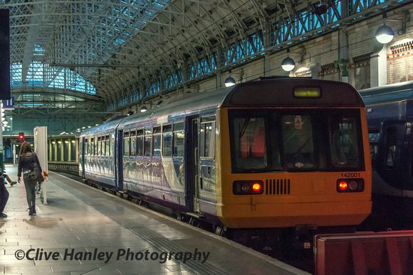 At Manchester Piccadilly Class leader unit 142001 sits awaiting its next run to Chester.