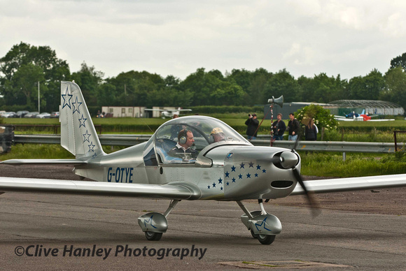 9.46am. G-OTYE Aerotechnic EV-97 Eurostar arrives and was directed to the display area.