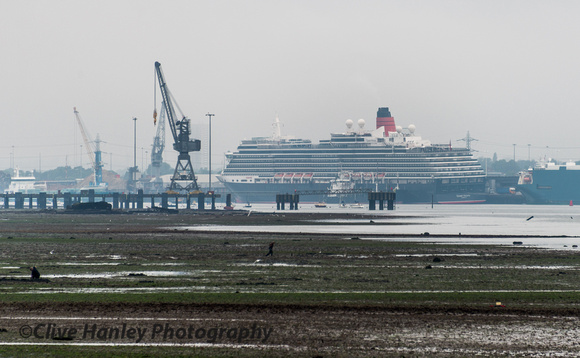 Queen Victoria was moored a mile away at the north west terminal.