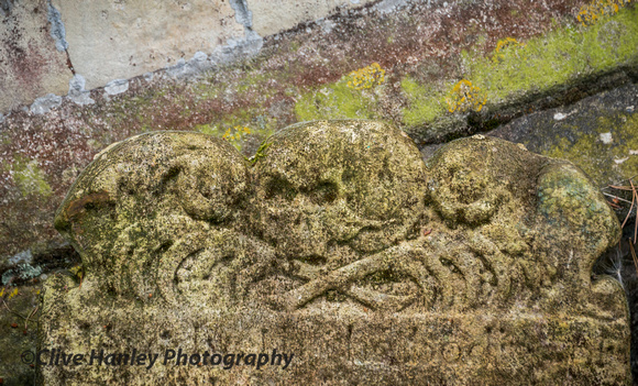 Skull & crossbones on a gravestone