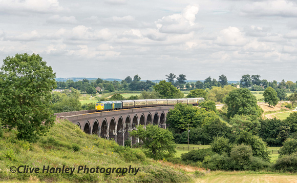 The Class 24/26 combination crosses Stanway viaduct with D6575 hanging off the back.