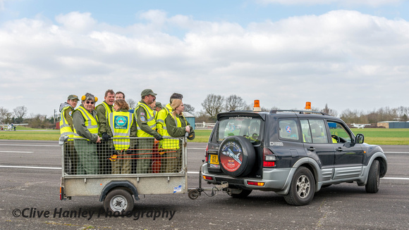 A contingent of volunteers headed off to secure the market side of the runway - and rattle their collection buckets.
