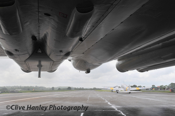 11.38am. Meanwhile I sought shelter underneath the aircraft and a chance to dry my cameras.