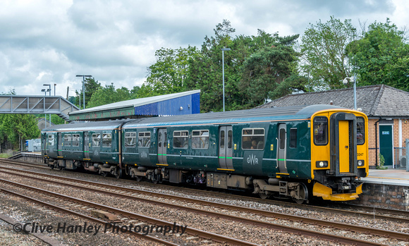 A Class 150 two car unit arrives wearing the latest drab green GWR livery.