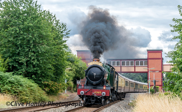 GWR Hall Class 4-6-0 no 4965 Rood Ashton Hall powers through Henley-in-Arden station with the return lunchtime run to Birmingham.