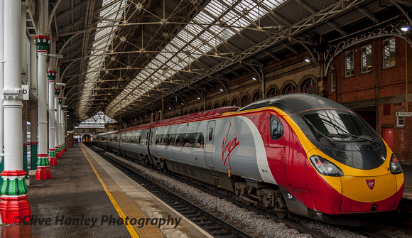 A Virgin Pendolino has arrived from the south.