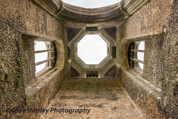 Looking up to the sky through the ruined Abbey tower.