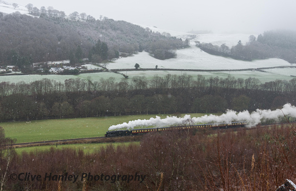 Next train to appear was the GCR based Stanier 8F no 48624. I had chosen the high forestry road for these shots.