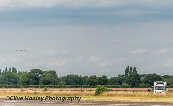 The Red Arrows display team flew past in a 4 ship and a 5 ship formation.
