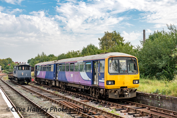 Pacer Class 144 DMU no 144007 stands at Oswestry