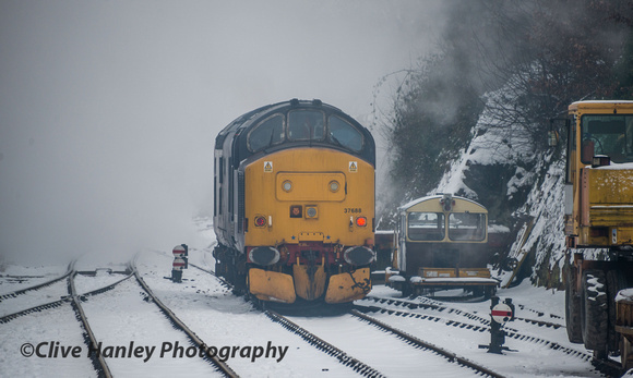 A Class 37 no 37688 fitted with a mini snow plough had been used early morning to check the line.