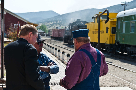 The crew, Engineer John Tyson, Conductor and Mark Bassett the Railway Director discuss the schedule before our train departs from East Ely.