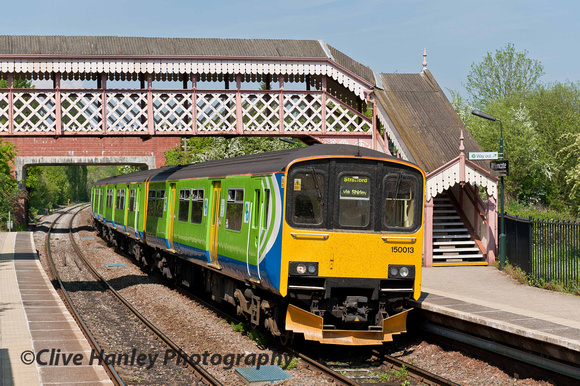 Unit 150013 arrives at Wilmcote