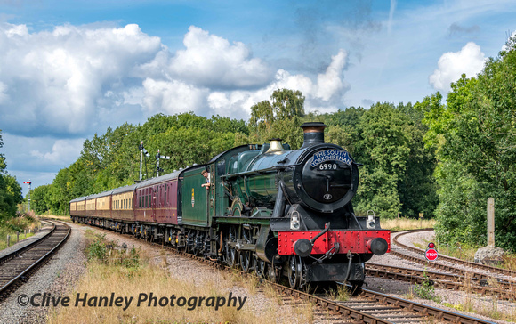 6990 Witherslack Hall restarts away from its stop on the reservoir bridge with the lunchtime dining train.
