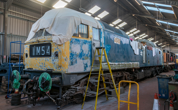 Inside the diesel shed. D1693 is being overhauled.