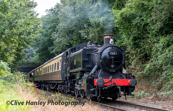 Hawksworth 0-6-0 Pannier tank no 1501 exits the tunnel as it descends from the summit of the line.