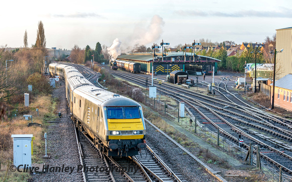68009 propels its train from the sidings towards Kidderminster to form a train to London Marylebone.