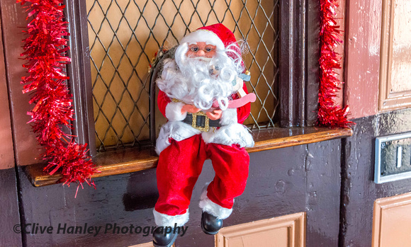 A miniature Santa was sitting in the booking hall!