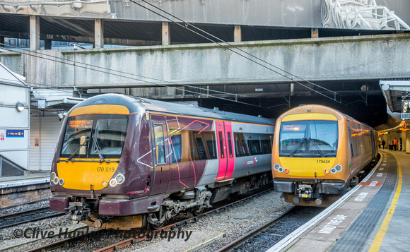 Contrast of two unit liveries. Cross Country and West Midland Trains.
