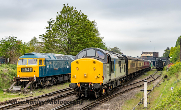 Class 37 no 37714 departs Loughborough with the 9.55. On the back is D123