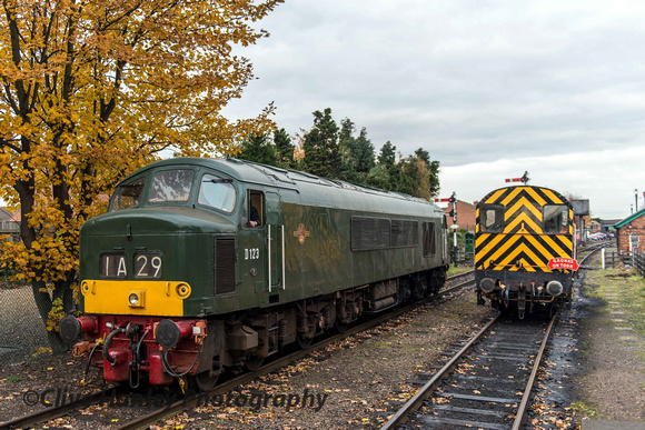 D123 moves past the 08 shunter to take its place at the head of the "Santa" special.